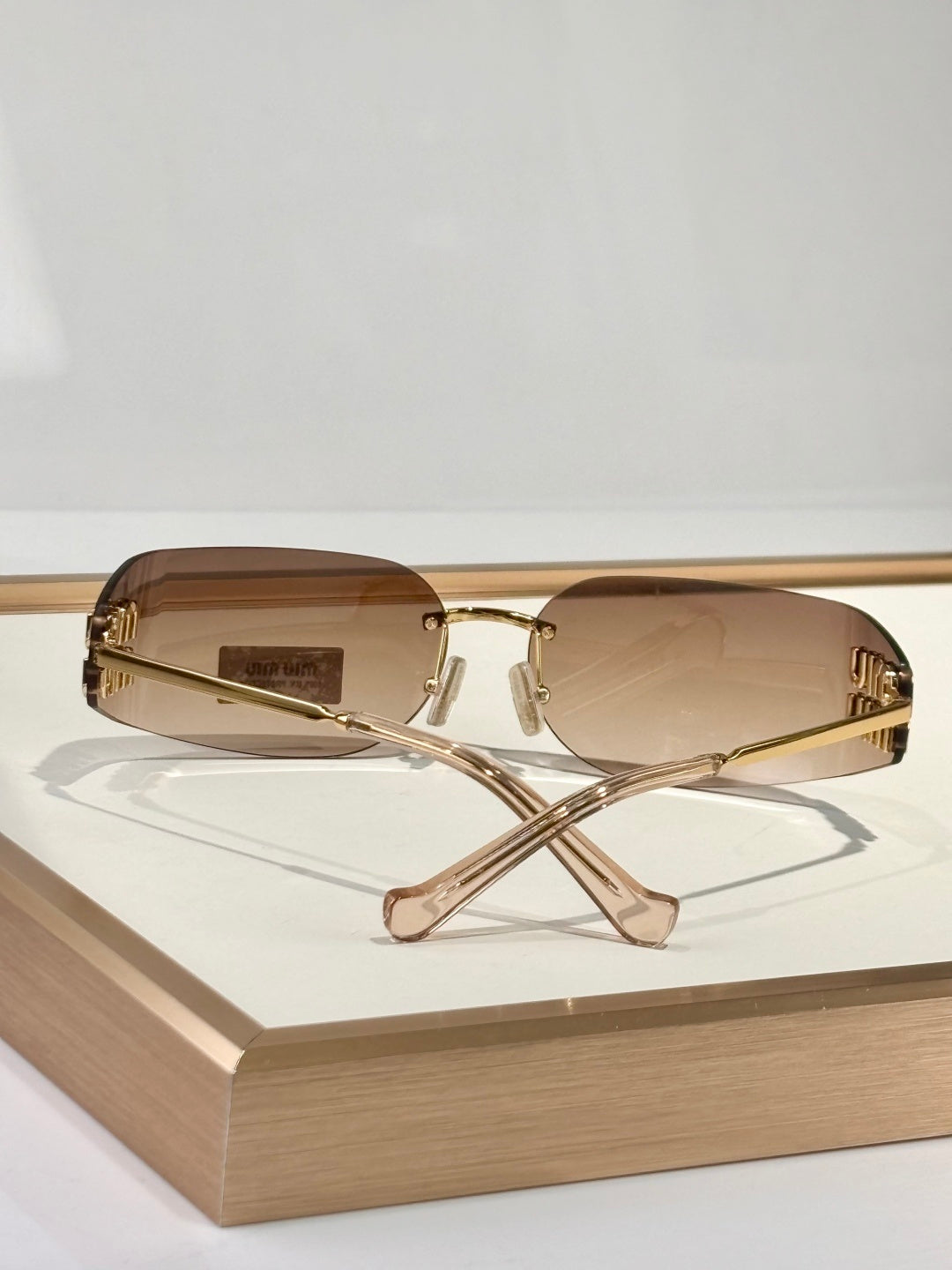 Gold Rimless Shield Sunglasses
