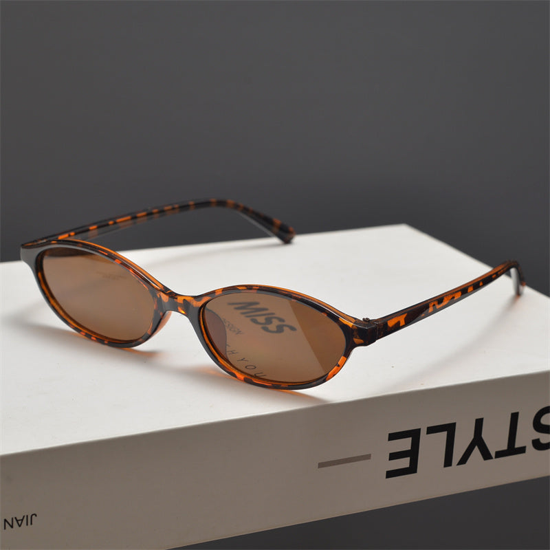 Slim Oval Acetate Sunglasses - women's accessory, detail view 21 | LUXIUM MARKET