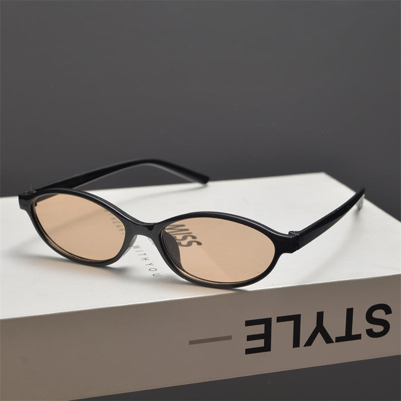 Slim Oval Acetate Sunglasses - women's accessory, detail view 17 | LUXIUM MARKET