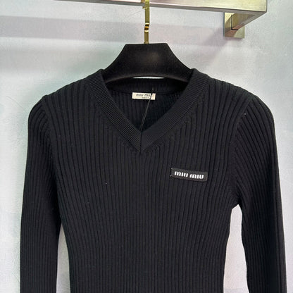 Ribbed High-Neck Wool Sweater - women's clothing, detail view 4 | LUXIUM MARKET